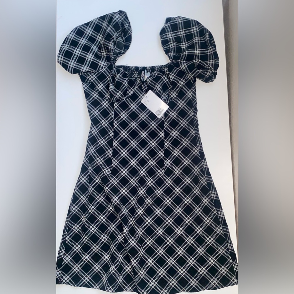 This dress is from H&M size XS